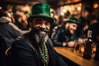 © Jioo7 - Handsome bearded man in a green leprechaun hat with a beard posing in a pub