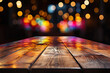 Empty wooden table for product placement with festive glittering blurred lights on background