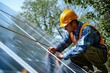 A man wearing a hard hat and safety vest is seen working on a solar panel. This image can be used to illustrate the concept of renewable energy and construction