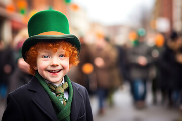 Happy redhead boy in Patricks Day attire outdoors