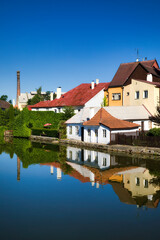 Sticker - Houses Reflecting in the Vajgar Pond in the Hamersky Potok River at Jindrichuv Hradec in the Czech Republic