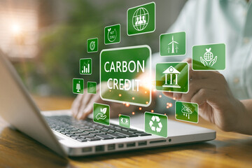 Wall Mural - Carbon credit market concept. Green energy, Businesswoman with Carbon credit icon. Net zero in 2050 year. Green energy icon around it. Carbon Neutral in industry Net zero emission eco energy.