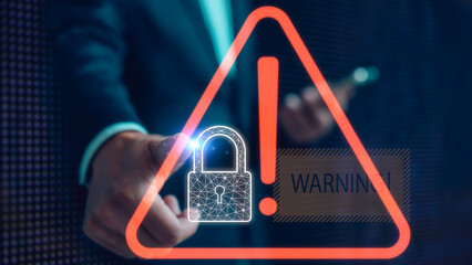 Wall Mural - risk of internet network security concept, hand touching triangle warning sign  with triangle caution warning sign and padlock for notification error and maintenance, e-document data protection