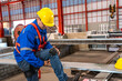 © Jack Tamrong - Solar engineer worker preparing protection gears ready to work on height