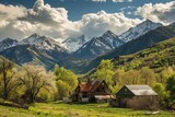 Fototapeta Krajobraz - An alpine village basks in the afternoon sun, its charm amplified by the stunning mountain backdrop and the vivid green of spring