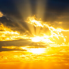 Wall Mural - sunset sky with sunset clouds, sun rays and dramatic sky