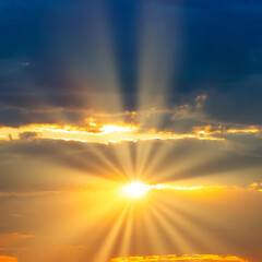 Wall Mural - sunset sky with sunset clouds, sun rays and dramatic sky