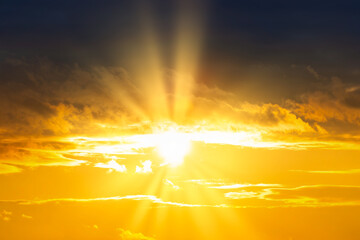Wall Mural - sunset sky with sunset clouds, sun rays and dramatic sky