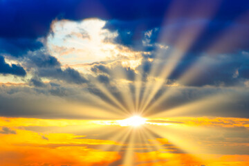 Wall Mural - sunset sky with sunset clouds, sun rays and dramatic sky