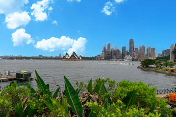 North Sydney water front residential property Circular Quay and Sydney Rocks Ferry on Sydney Harbour NSW Australia.  Lovely colours of the Sky and water