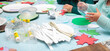 children making paper crafts, creativity lessons