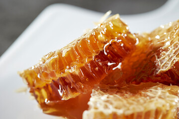 Wall Mural - honeycomb honey on plate	