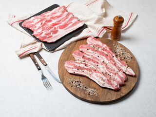 Wall Mural - Raw meat and spices on wooden board	