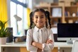 smiling african american schoolgirl with crossed arms at workplace, Cheerful indian girl standing at home office looking at camera, AI Generated
