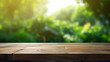 wooden table space with green home backyard view blurred