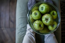 A Bowl Of Green Apples