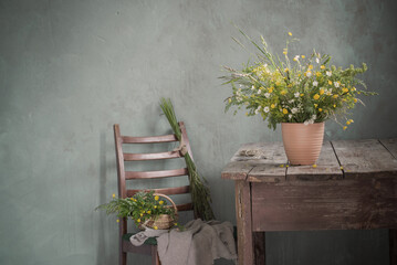 Wall Mural - bouquet of wild flowers on old wooden table