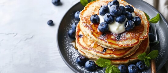 Aufkleber - Chia seed pancakes with yogurt and blueberries on plate closeup view. with copy space image. Place for adding text or design