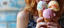 Girl Enjoying Ice Cream In A Cone With Ice Cream Balls. With Copy Space Image. Place For Adding Text Or Design