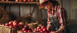 A factory worker offering fresh apples in storage. with copy space image. Place for adding text or design