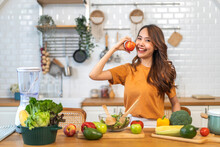 Portrait Of Beauty Body Slim Healthy Asian Woman Big Smile Cooking And Preparing Vegan Food Healthy Holding Apple, Red Apple, Dental, Teeth, Fruit In Kitchen At Home.Diet.Fitness, Healthy Food