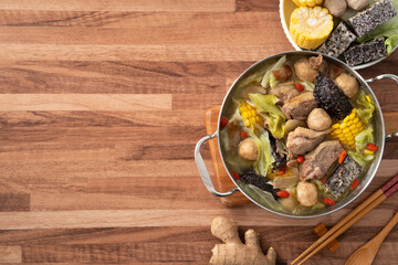 Delicious ginger duck hot pot soup with fresh vegetables in Taiwan.