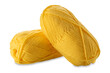Balls of yellow-colored wool yarn isolated on white with clipping path included