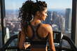 Back view of pretty woman doing sports on a treadmill against the background of a panoramic window.