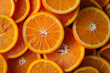 Slices of cut orange top view background, pattern