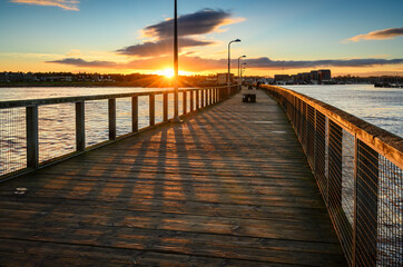 Wall Mural - sunset above amble from south jetty. amble harbour is actually called warkworth harbour and is set o