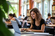 © Instacraft.Studio - College students use laptops in the university library to study together
