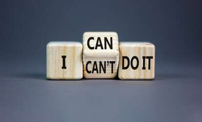 Wall Mural - I can do it symbol. Concept word I can or can not do it on beautiful wooden cubes. Beautiful grey table grey background. Business and i can or not do it concept. Copy space.