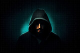 Fototapeta Konie - A hooded computer hacker cracking digital code to hack into the mainframe of a network and disrupt systems to black mail, hold to ransom or take down companies, products or service