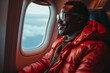 © -=RRZMRR=- - smile man in red jacket and glasses sitting in seat in airplane and looking out window