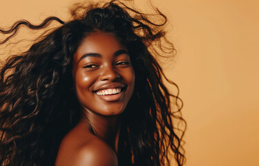 Wall Mural - Beautiful smiling black woman with healthy shiny hair	