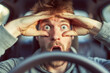 © Konstiantyn Zapylaie - Man in the driver's seat, holding his head in disbelief, symbolizing accident, insurance, and emotional distress