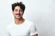 © SHOTPRIME STUDIO - Smile man lifestyle standing t-shirt white portrait isolated background student fashion person serious hipster
