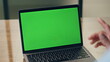 © stockbusters - Entrepreneur hands gesturing mockup laptop office. Ceo talking chromakey device