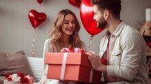 Beautiful Young Couple At Home. Hugging, Kissing And Enjoying Spending Time Together While Celebrating Saint Valentine's Day With Gift Box In Hand And Air Balloons In Shape Of Heart On : Generative AI