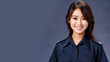 Asian woman in navy uniform smiling isolated on pastel background