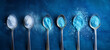 © msroster - spoons on blue painted powder