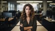 © Ameer - Confident businesswoman gazing at the camera in a modern office setting, professional female entrepreneur in corporate environment