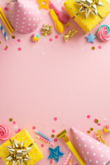 Wall Mural - Lovely birthday ensemble idea. Overhead shot of table decked out in festive embellishments, wrapped gifts, party hats, pipe, candles, straws, confetti on soft pink surface. Space for text or advert