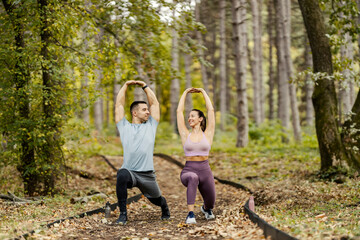 Wall Mural - Athletes are stretching and doing workouts in nature.