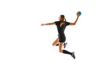 Fit young woman engaged in intense handball training, perfecting her throwing and catching abilities against white studio background. Concept of professional sport, movement, dynamic, championship. Ad