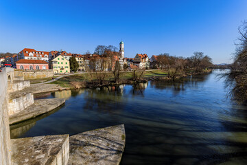 Wall Mural - View over the Danube river from the stone bridge in Regensburg, Bavaria, Germany.