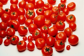 Wall Mural - cherry tomatoes on white background