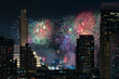 Happy New Year. Fireworks celebration surrounding of cityscape building.