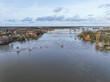 Luftbild vom Hochwasser der Weser mit der Weserbrücke in Petershagen, Nordrhein-Westfalen, Deutschland