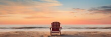 A Solitary Beach Chair Facing The Ocean At Sunrise, Inviting Relaxation And Contemplation